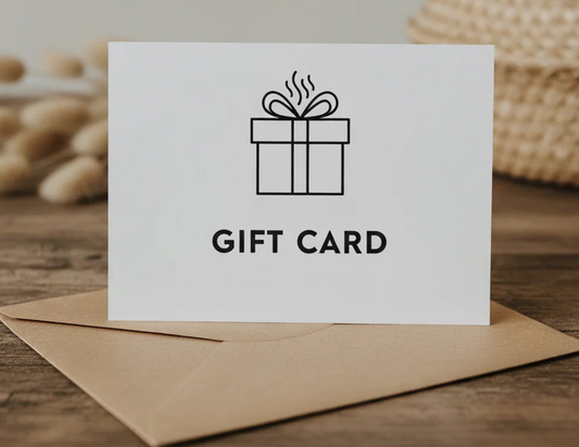 Gift card with a gift box icon on a wooden surface. Hot sauna cold plunge, relaxation lounge all included. Fire & Ice Sauna, Bolingbrook, Chicago, Illinois.
