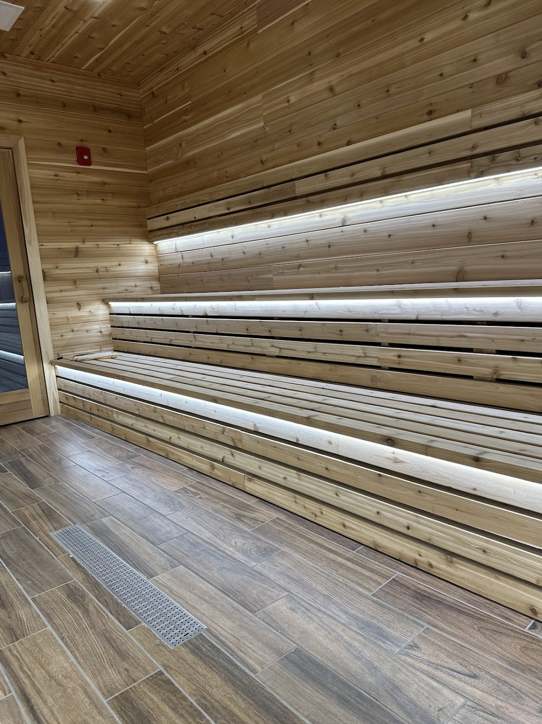 Wooden sauna interior with benches